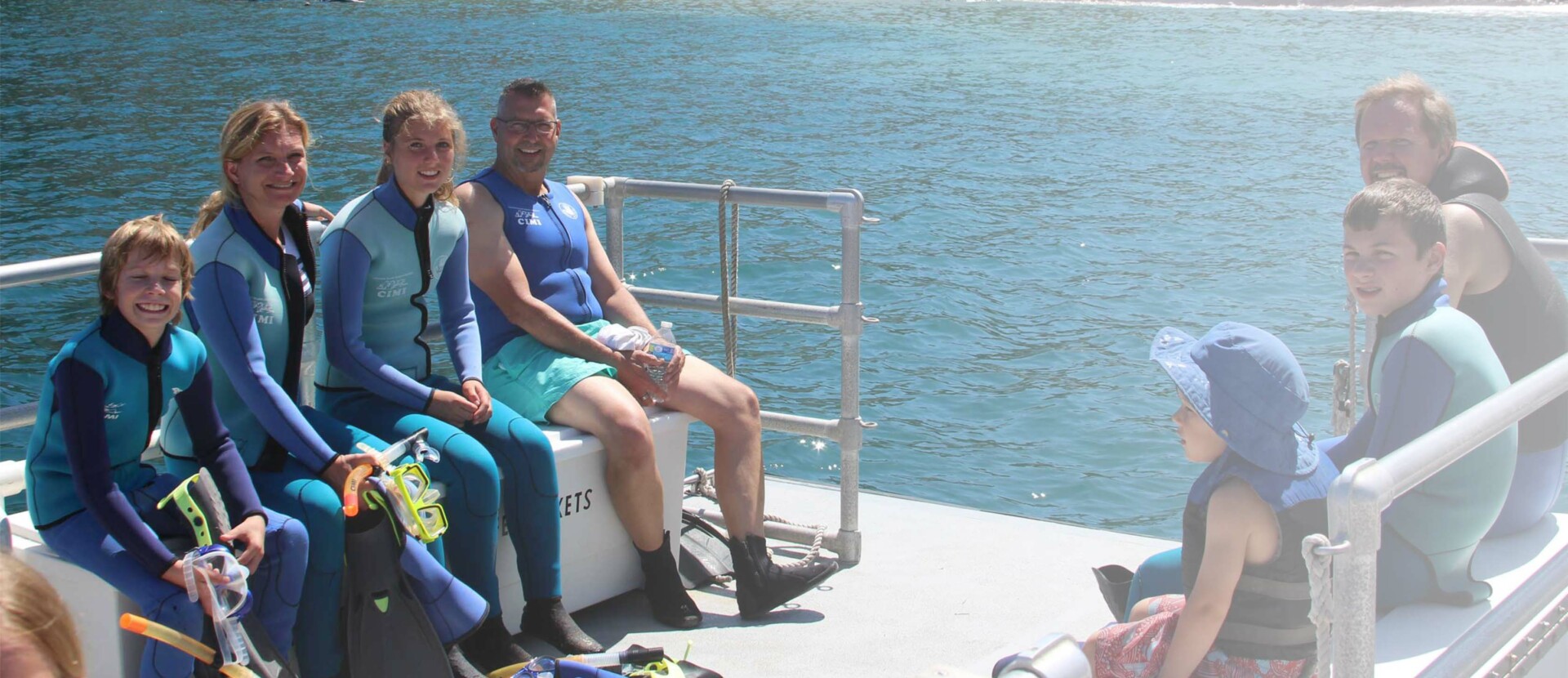 Snorkel group on boat.