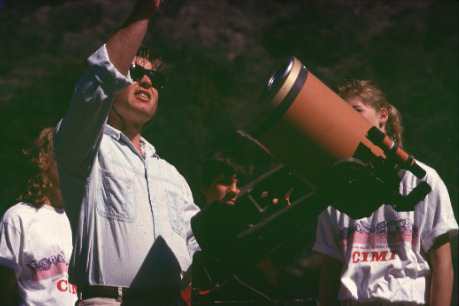 Man with telescope.
